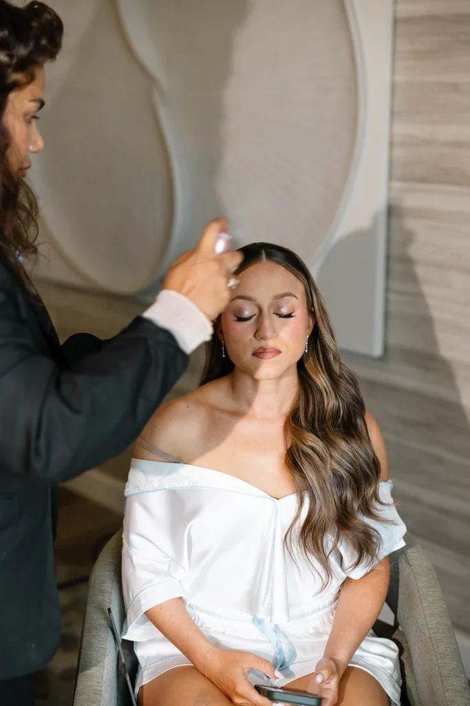 Touching up the bride's hair