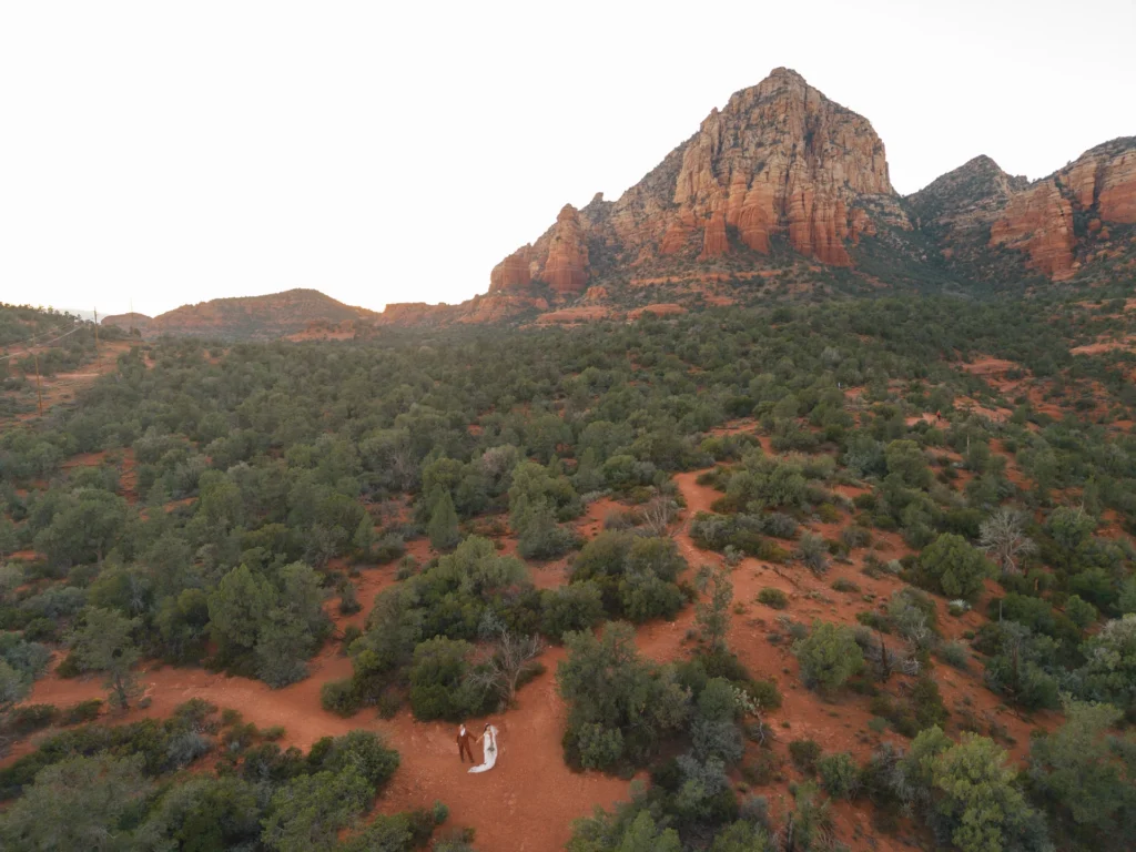 Aerial shot of wedding couple at the red rock landscape of Sedona, Eagle Dancer Resort 